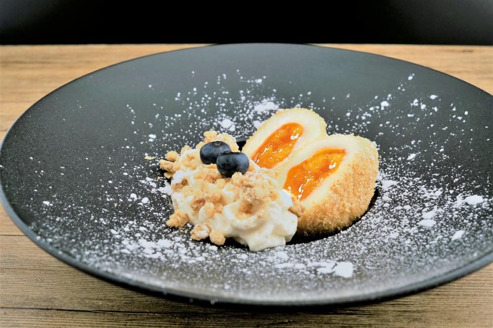 Bild zum Rezept "Marillenknödel mit Cheesecake-Creme"